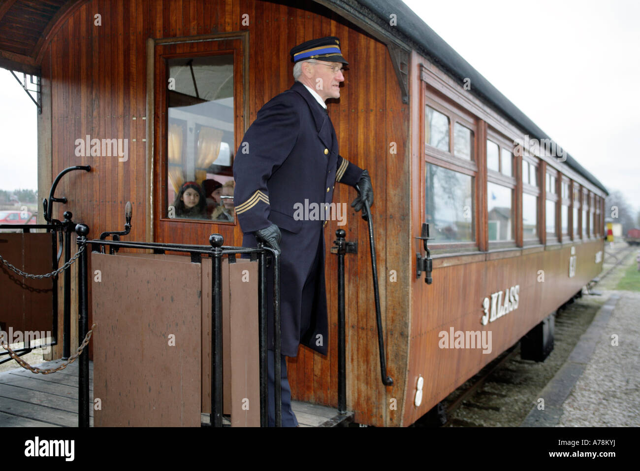 Vintage Train With Carriage From 1935 And Railway Official On Viewing Platform Of Coach At Dalhem Railway Station And Museum Stock Photo Alamy