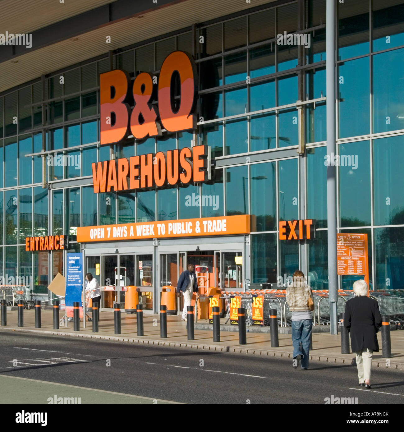 Customers walking towards entrance to large B&Q do it yourself