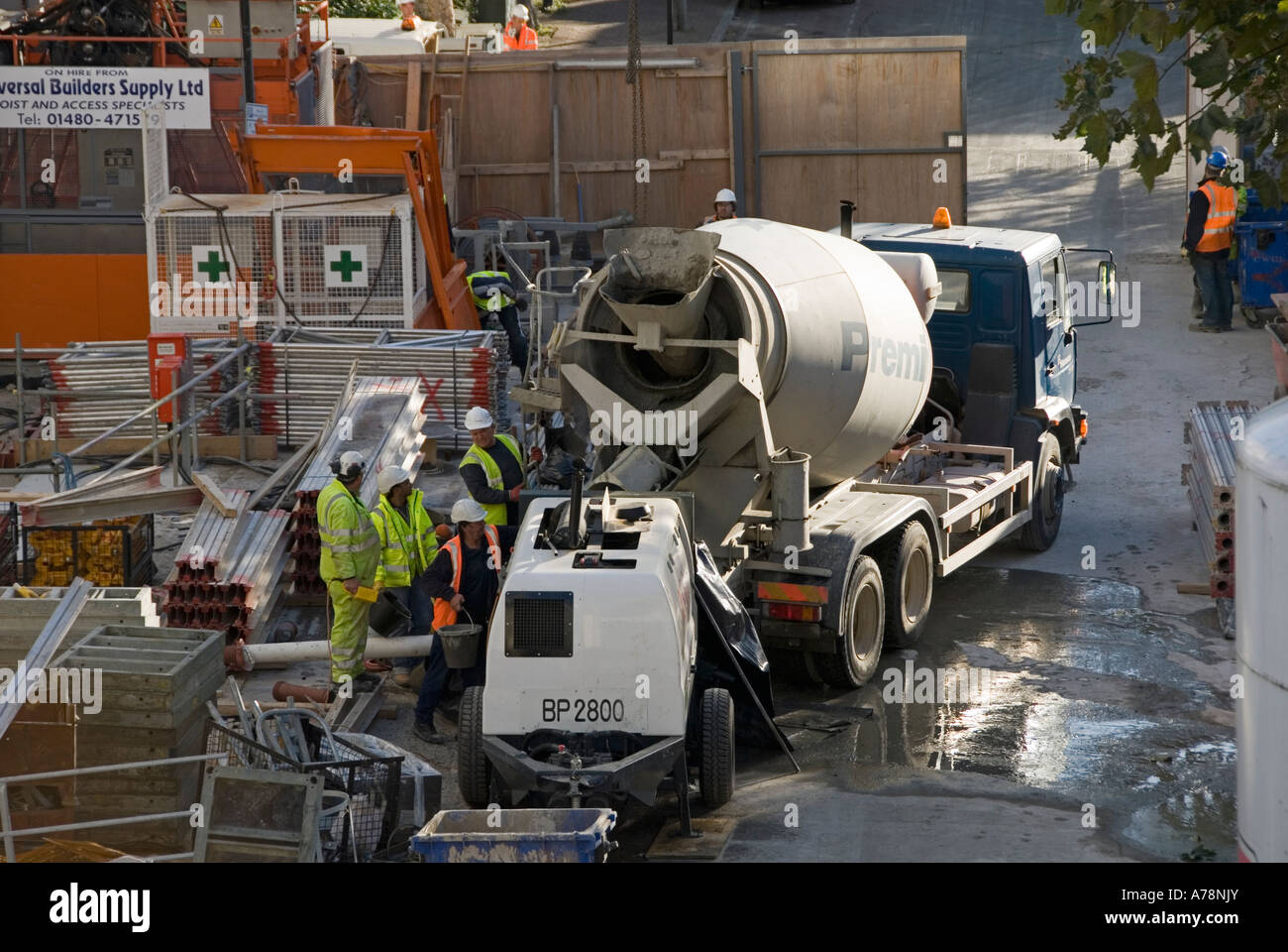 London congested building site compound with readymix concrete delivery