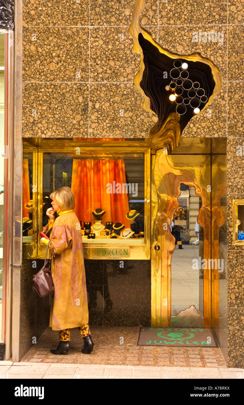 Old woman putting on lipstick hires stock photography and images Alamy