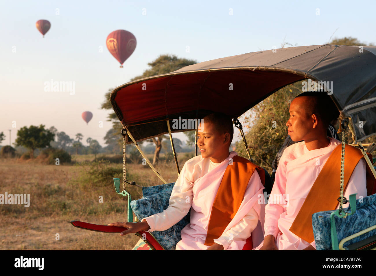 Nuns in a horse cart, at Bagan (Burma - Myanmar) Stock Photo