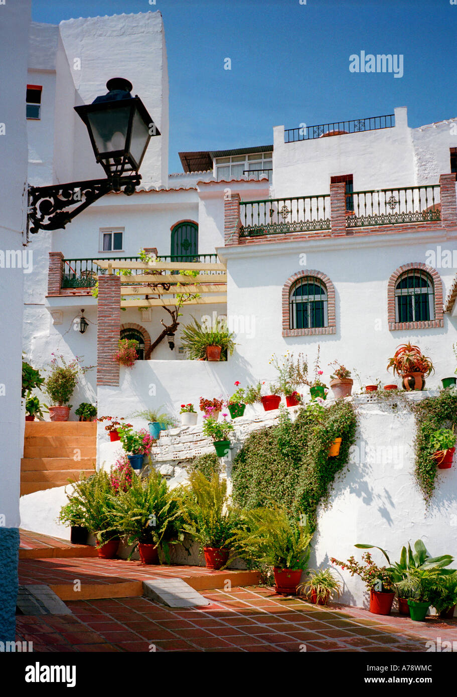 A great floral display in Calle Valencia in the hill village of Torrox, near Nerja, on the Costa del Sol, Malaga, Spain Stock Photo
