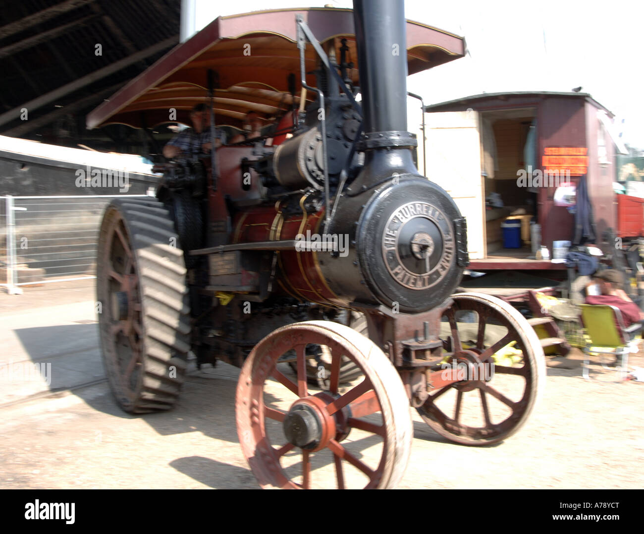 burrell steam traction engine pulls away in a blur of motion Stock Photo