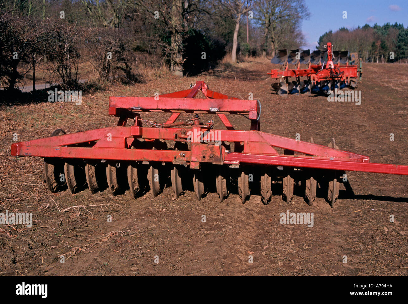 Ploughs furrowing machines for tilling the soil for planting Stock Photo