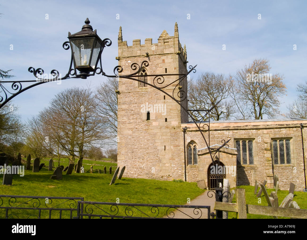 A view through the gate of Blore Church, in the Peak District ...