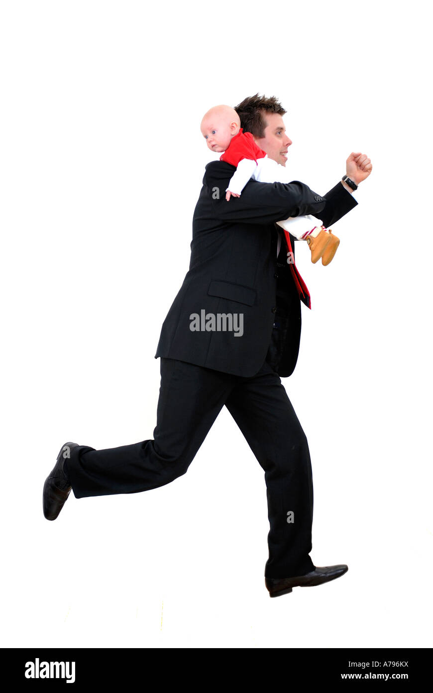 young businessman with small child baby in hurry rush Stock Photo