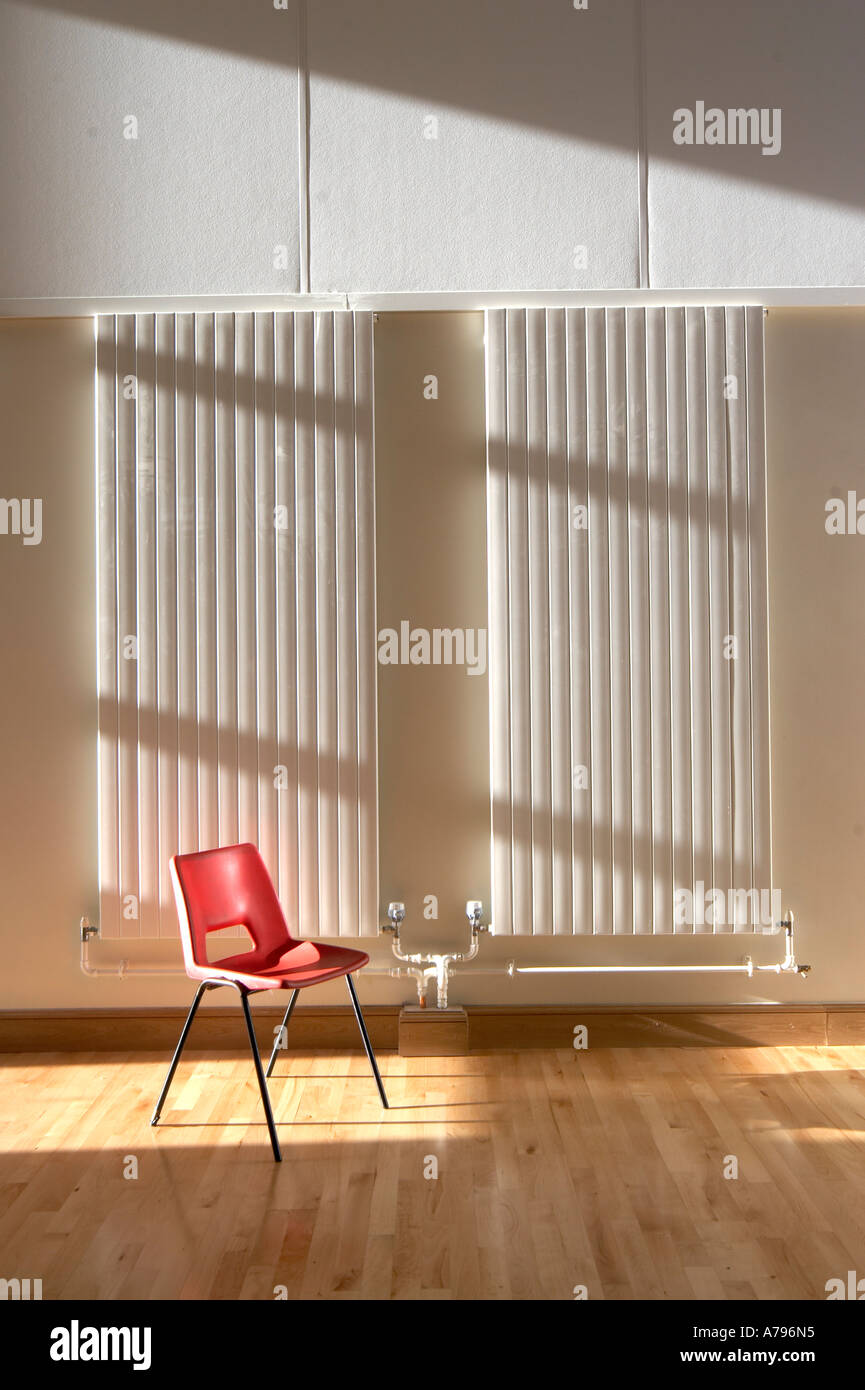 Abstract architectural image of radiator and chair in sunlight Stock ...