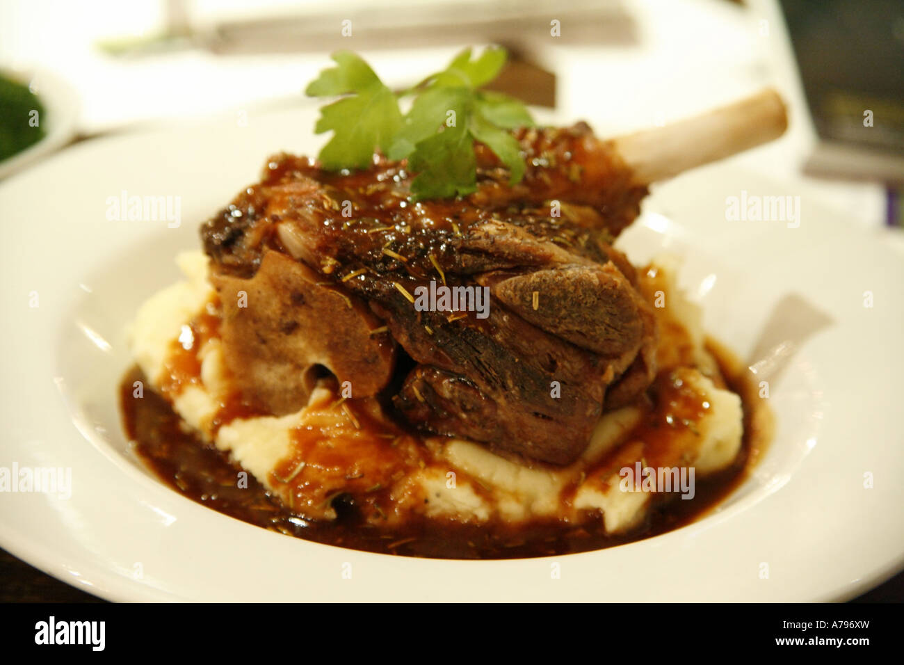 Lamb Shank on a Bed of Mashed Potato with Rosemary Infused Gravy Stock