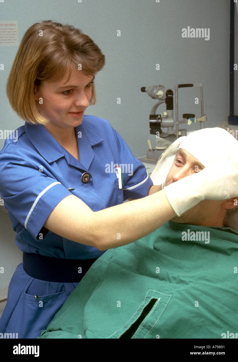 Nurse bandaging patients head Stock Photo