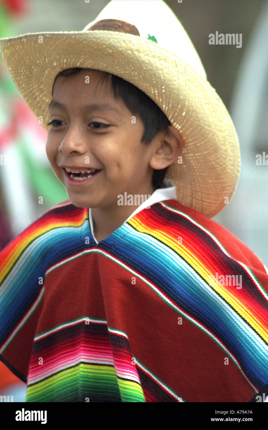 Performer age 7 in native dress at Cinco de Mayo Festival.  St Paul Minnesota USA Stock Photo