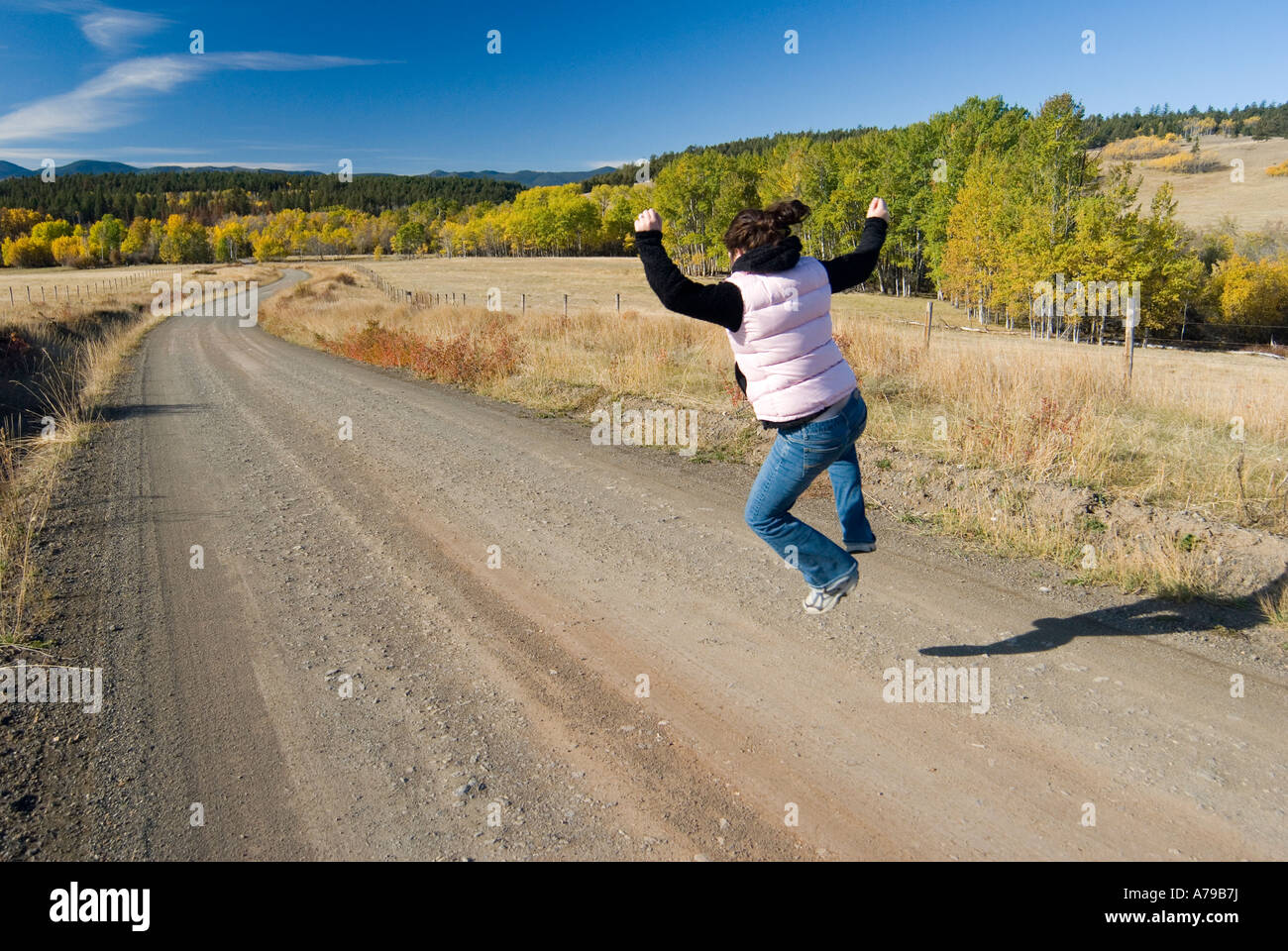 Woman clicking heels hires stock photography and images Alamy