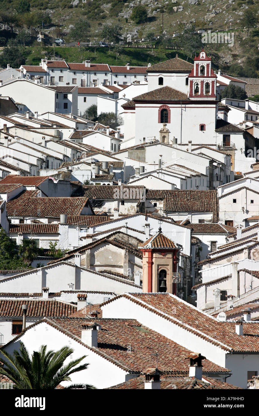 Whitewashed houses and terracotta tiled roofs overlapping in this overview of the town Grazamela Andalucia Spain Stock Photo