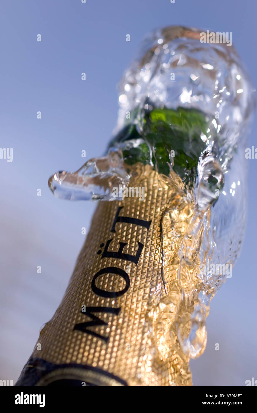 Bottle of champagne being opened in celebration Moet and Chandon Stock