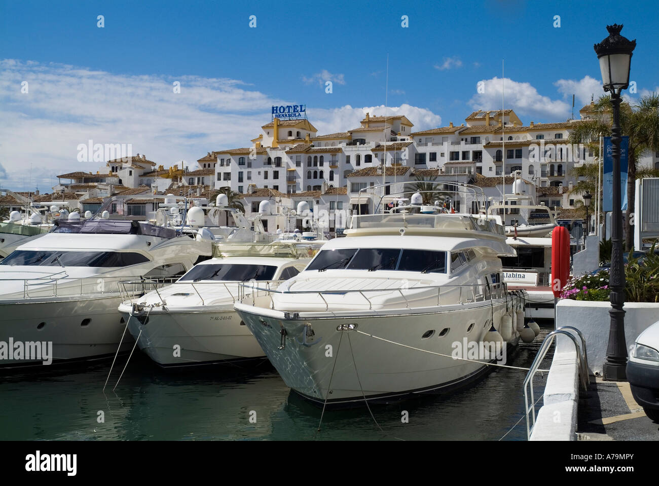 dh Harbour Marina PUERTO BANUS SPAIN Marbella Luxury yachts at jetty building overlooking harbor waterfront yacht berth rich mooring europe quayside Stock Photo