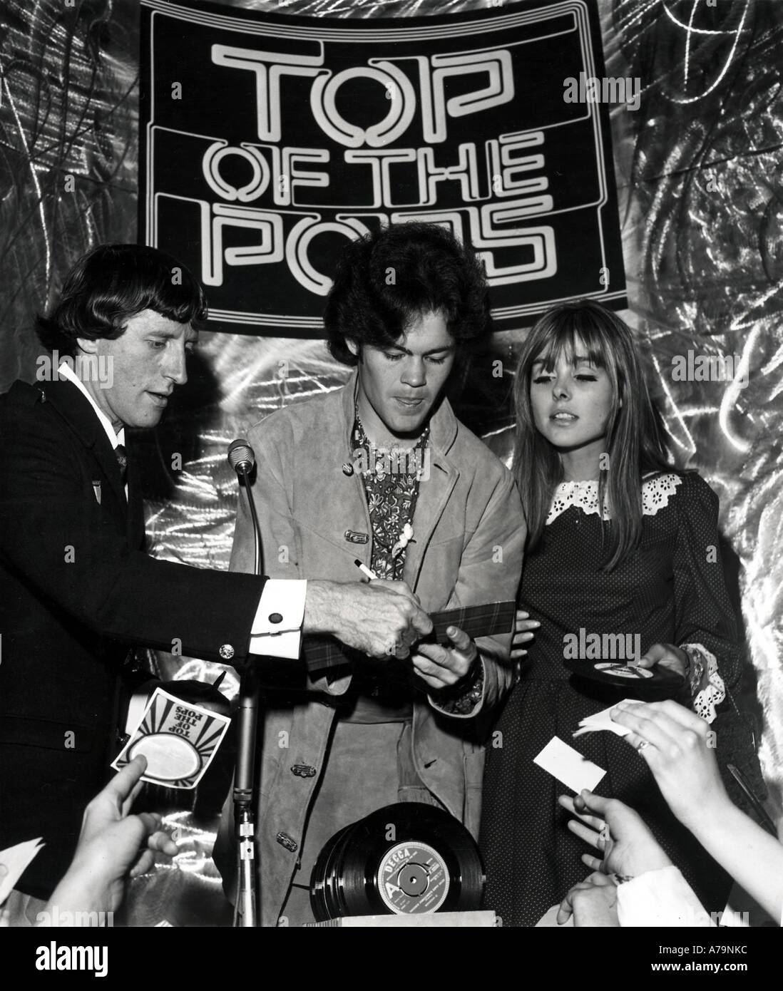 JIMMY SAVILLE  Mickey Dolenz of The Monkees and presenter Samantha Juste on BBC TV's Top of the Pops in 1963 Stock Photo