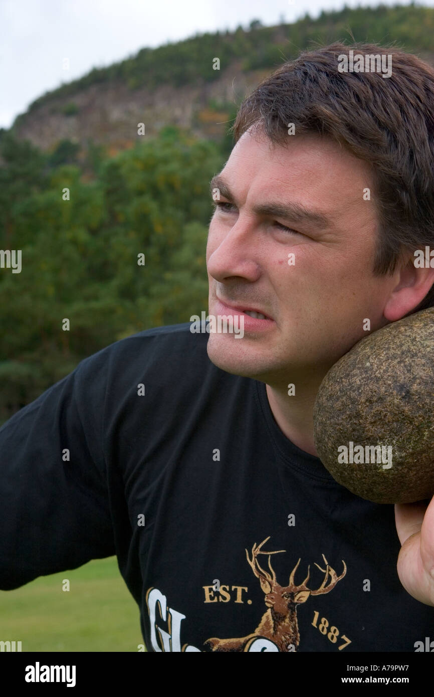 Putting the stone, traditional Scottish Highland games throwing the