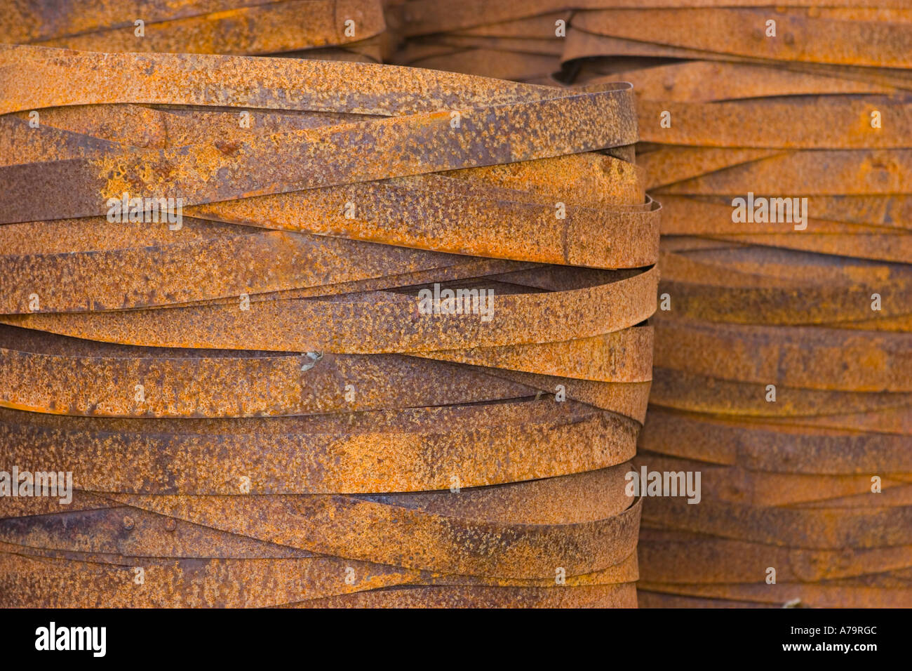Rusting hoops used to repair barrels in the manufacture of Scotland Whisky barrels at Speyside cooperage Dufftown Scotland uk Stock Photo