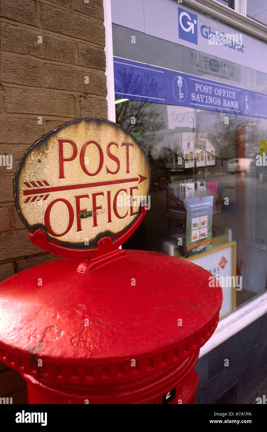 Cheshire Stockport Woodford Post Office sign on top of post box Stock