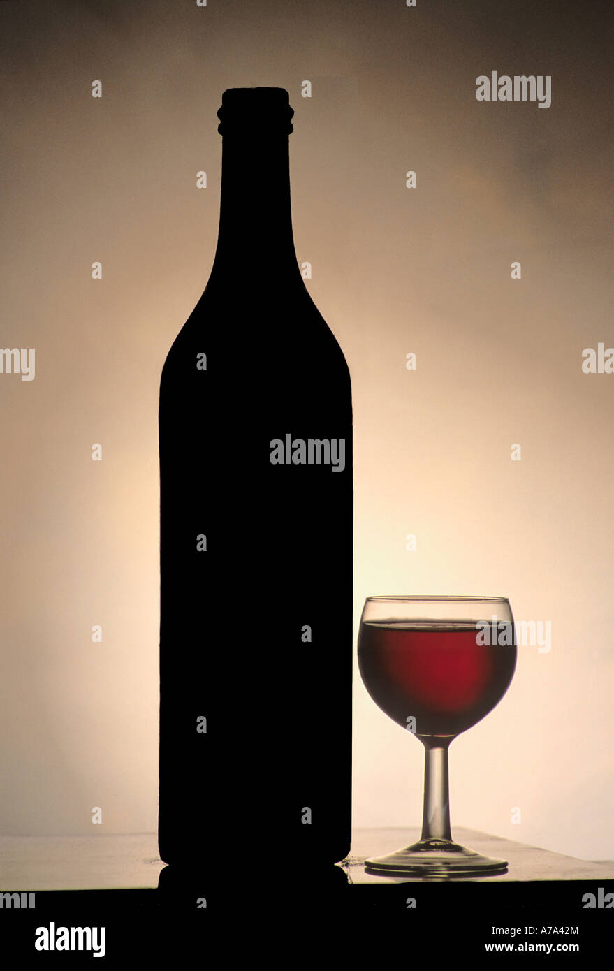 Red wine bottle and wine glass, silhouette Stock Photo