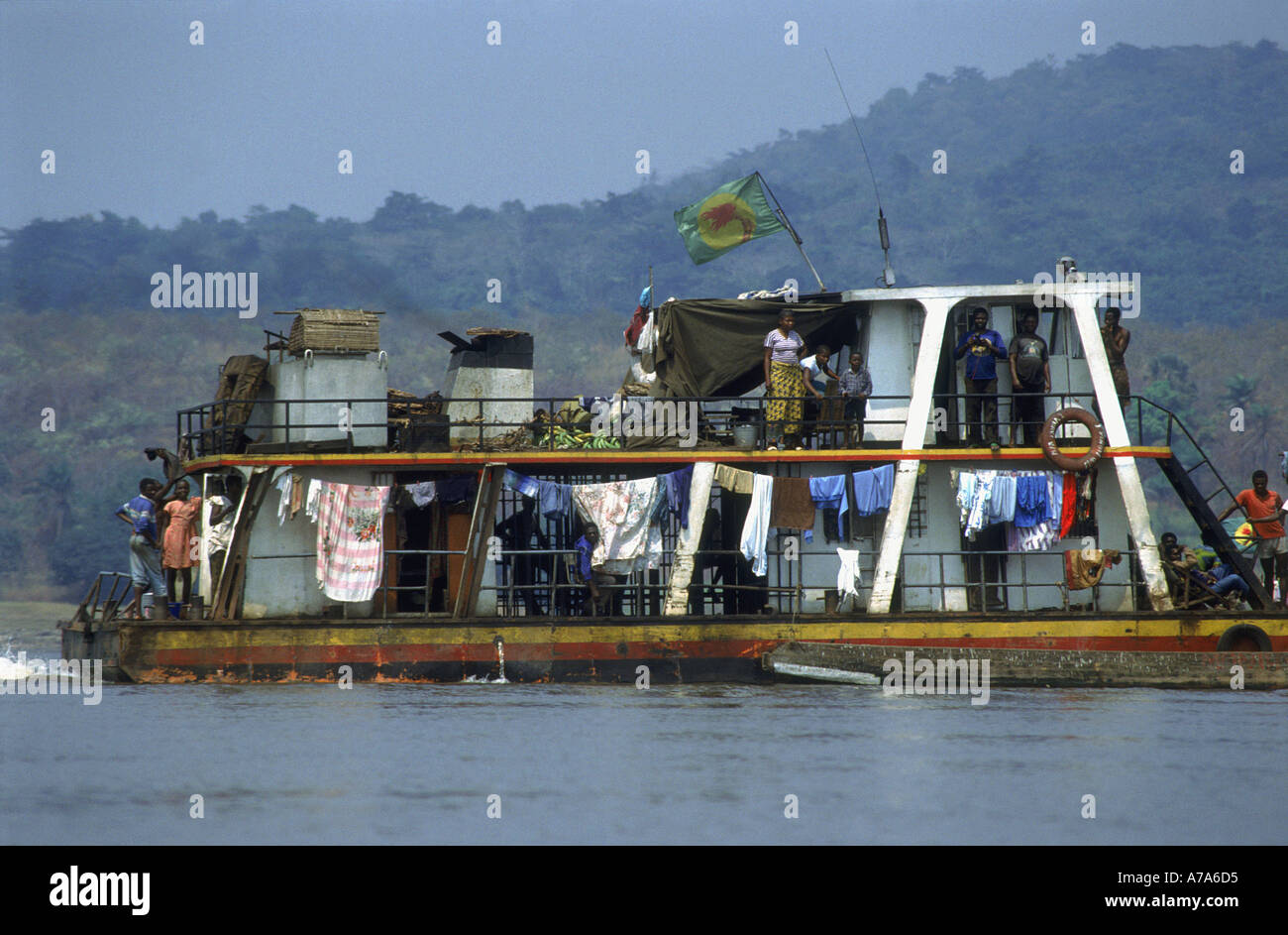 steamer on congo river with formerly flag from zaire democratic republic of congo congo kinshasa Stock Photo
