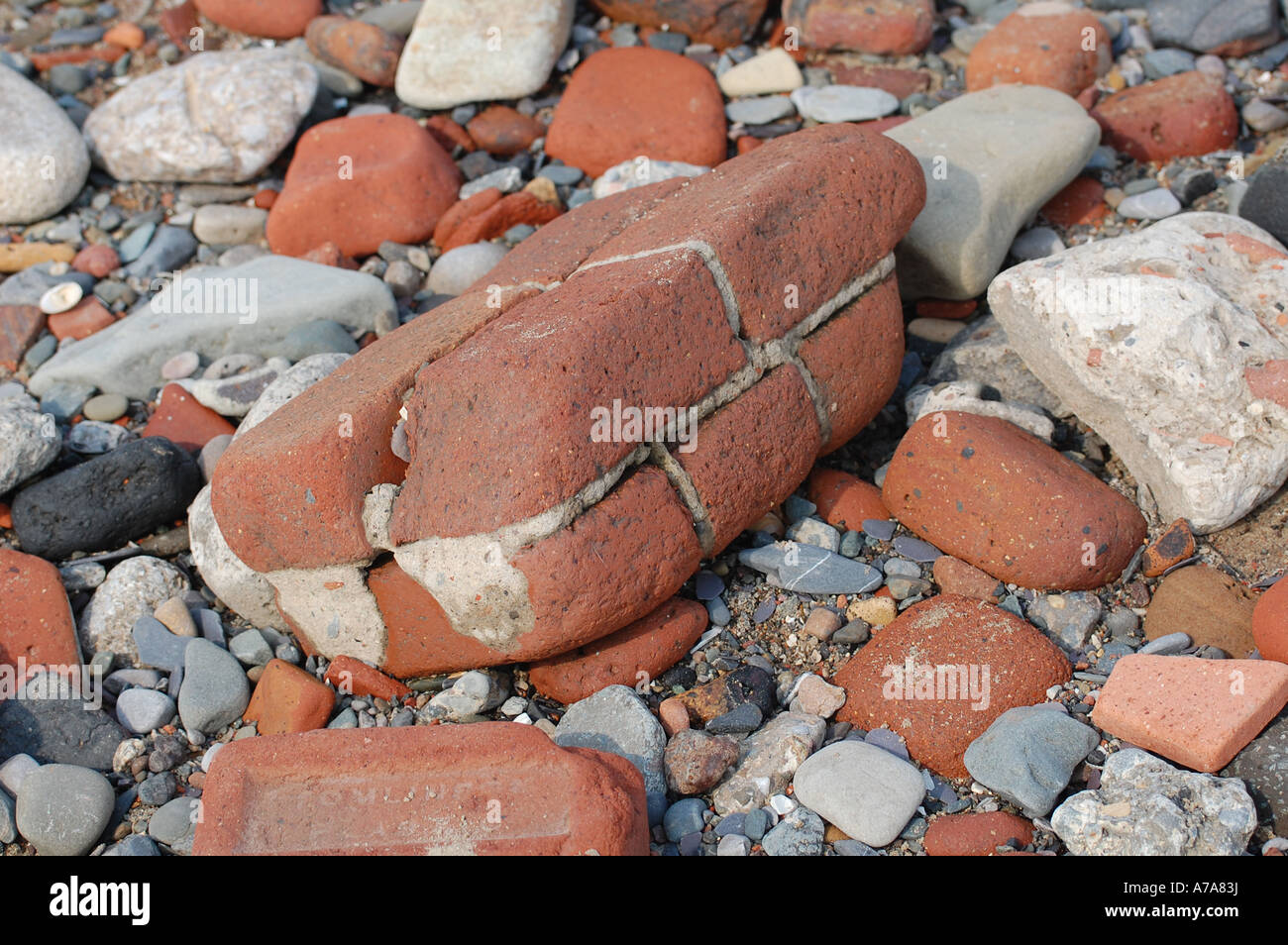 Weathered bricks from second world war damaged houses on Crosby Beach ...