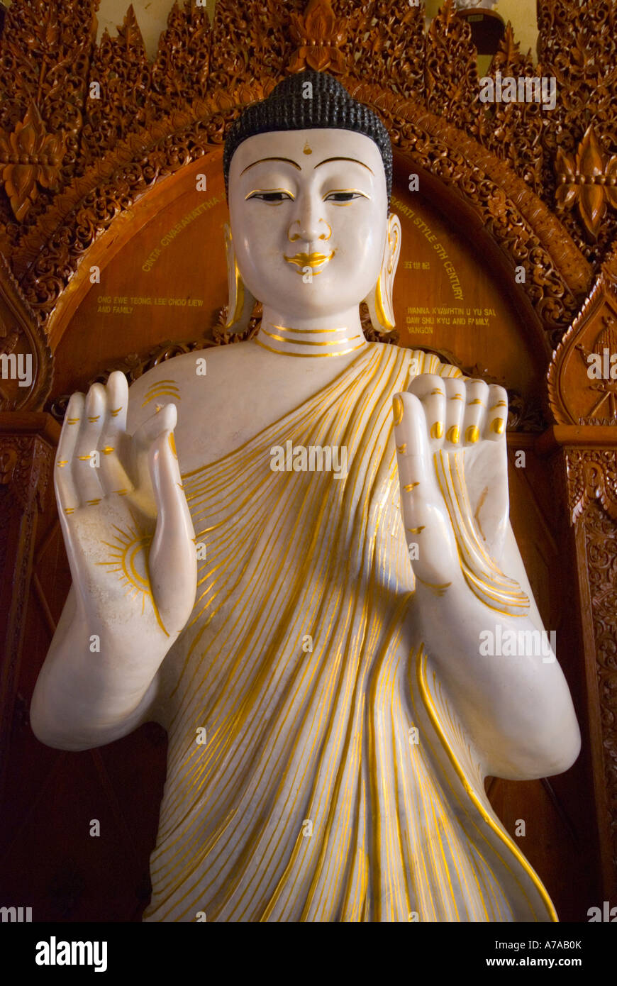 Representations of the Buddha in a Thai temple in Penang Malaysia Stock Photo