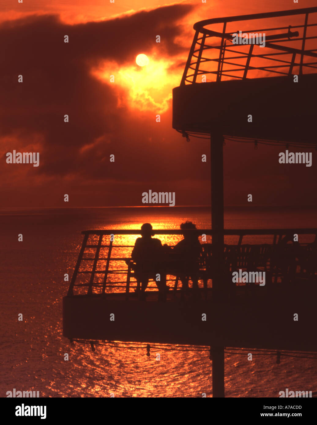 Cruise ship couple at sunset Stock Photo - Alamy