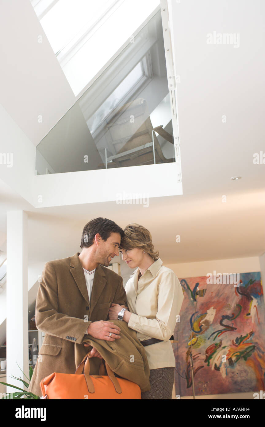 mature couple arm in arm in maisonette Stock Photo