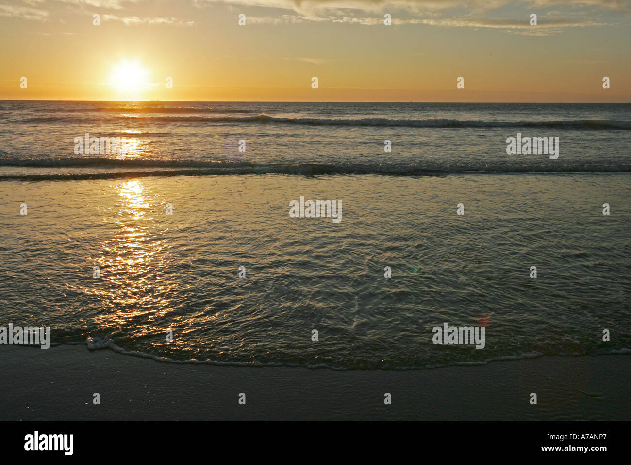 SUNSET ON THE BEACH Stock Photo - Alamy
