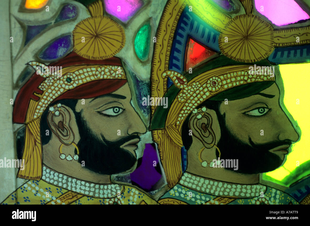 Painted and stained glass in City Palace Udaipur India Stock Photo