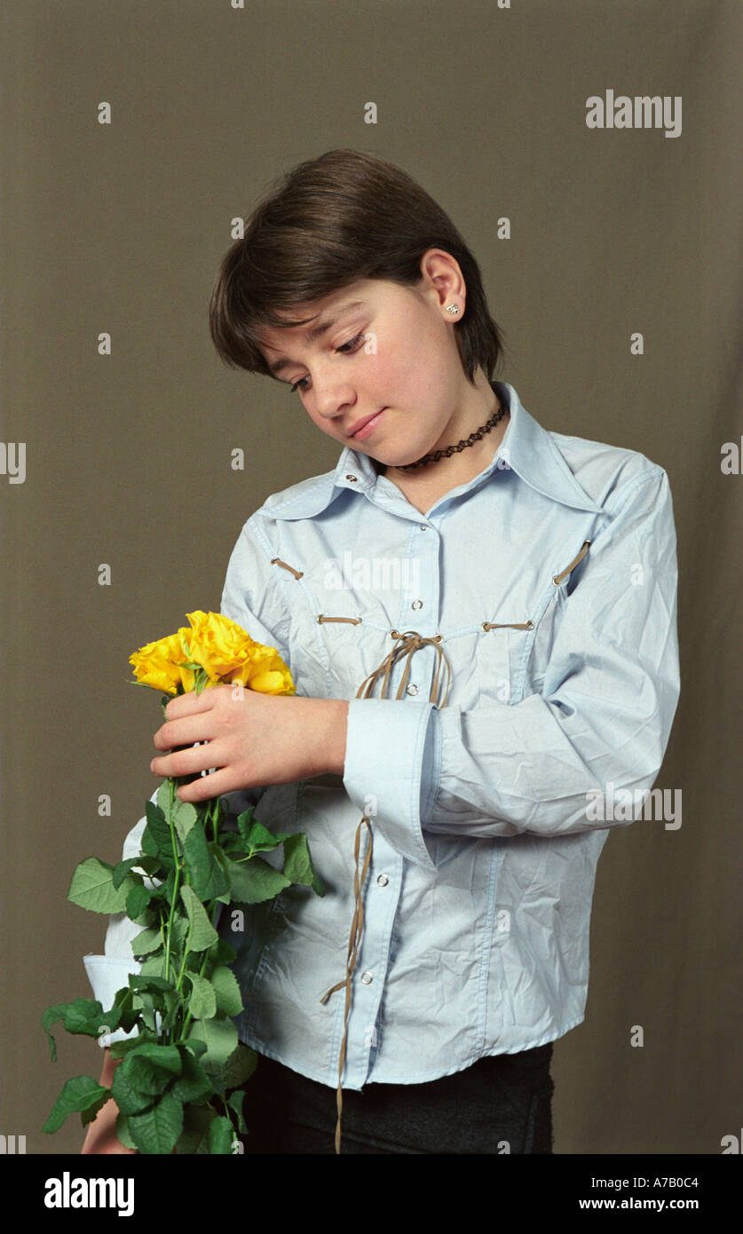 Teenage girl with roses Stock Photo - Alamy