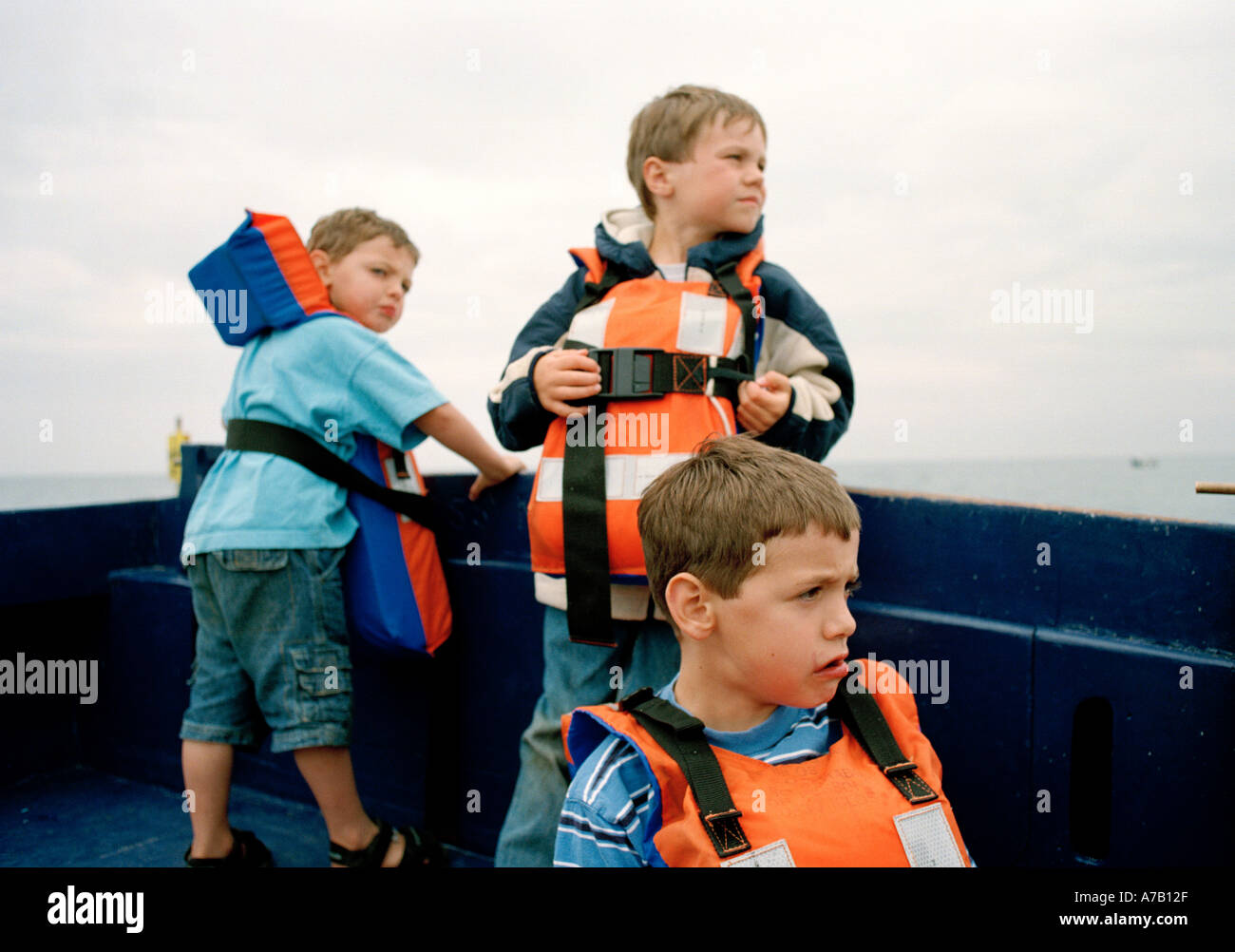 Children fishing boat life jacket hi-res stock photography and images -  Alamy