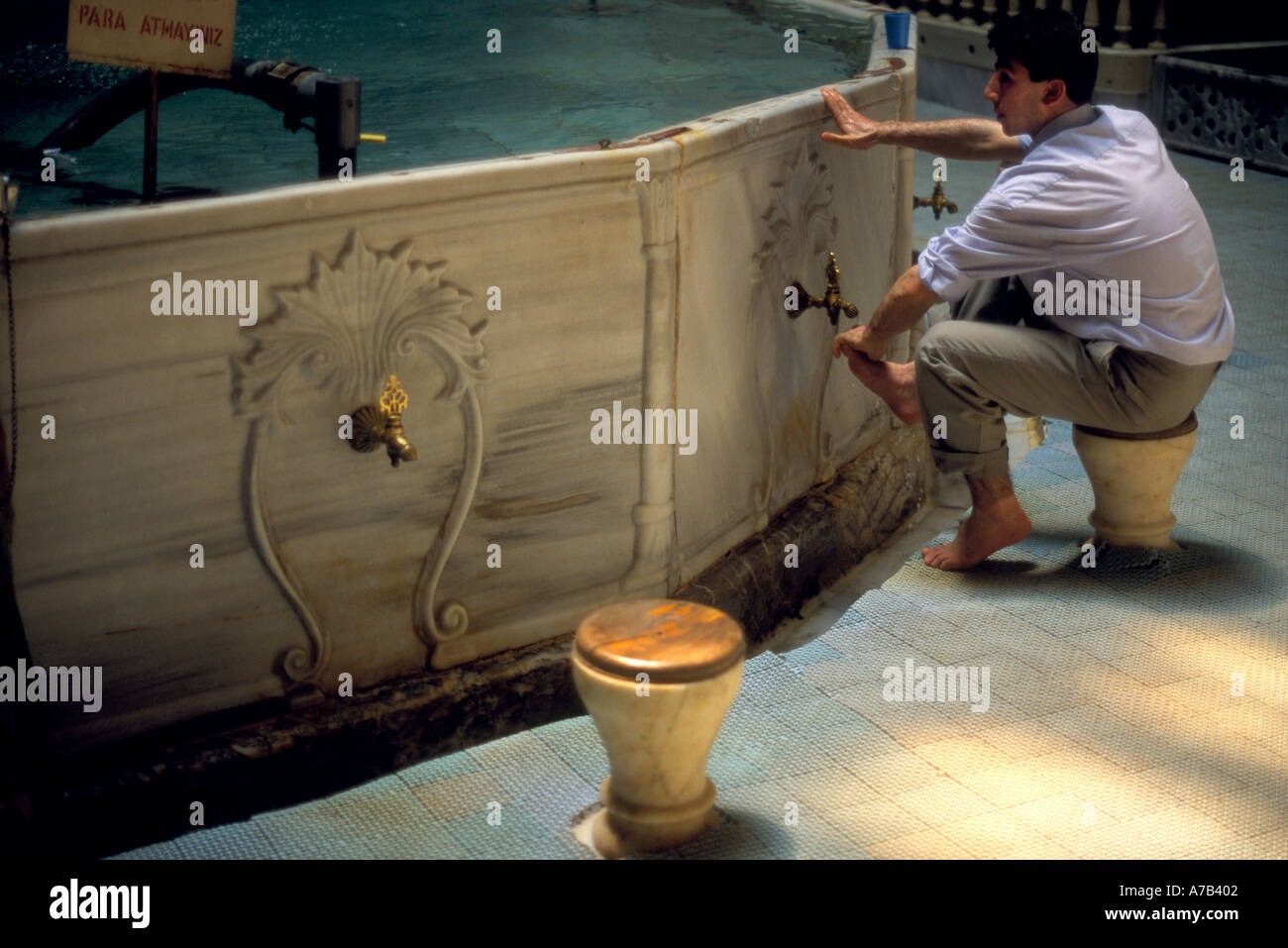 Washing man in mosque Konya Turkey Stock Photo