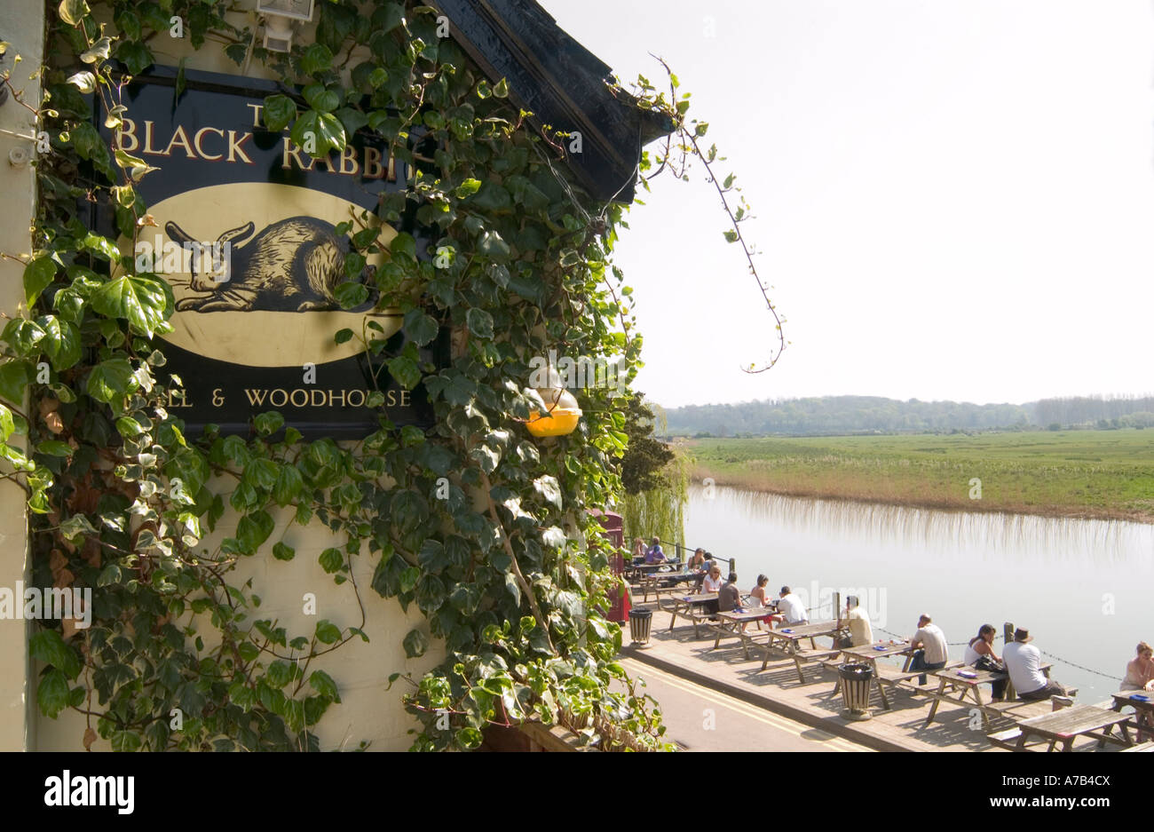 People relaxing at The Black Rabbit Pub ,South Stoke on The River Arun near Arundel, West Sussex, England, UK Stock Photo