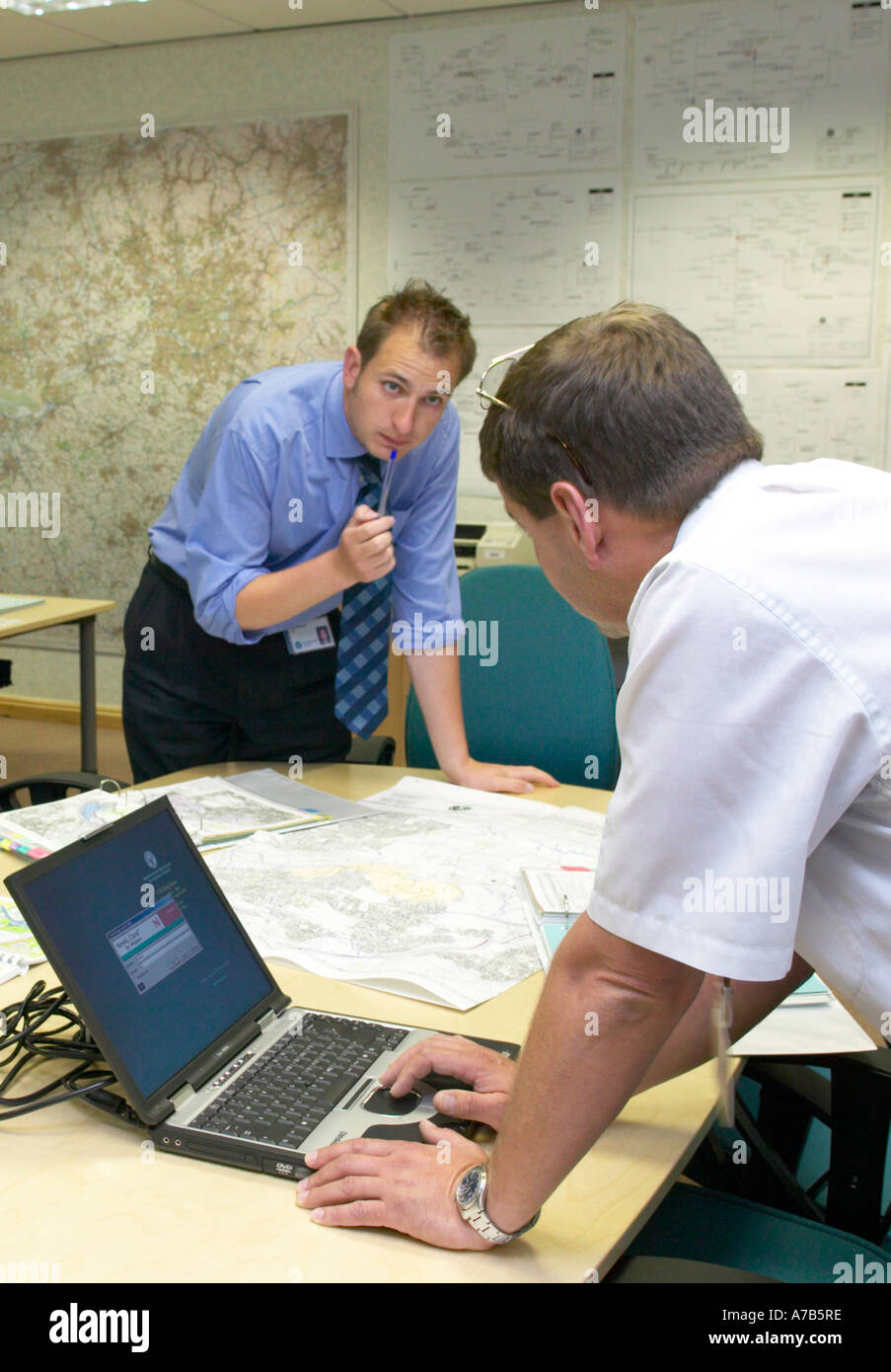 workers in the Environment Agency flood alert office England UK Stock Photo