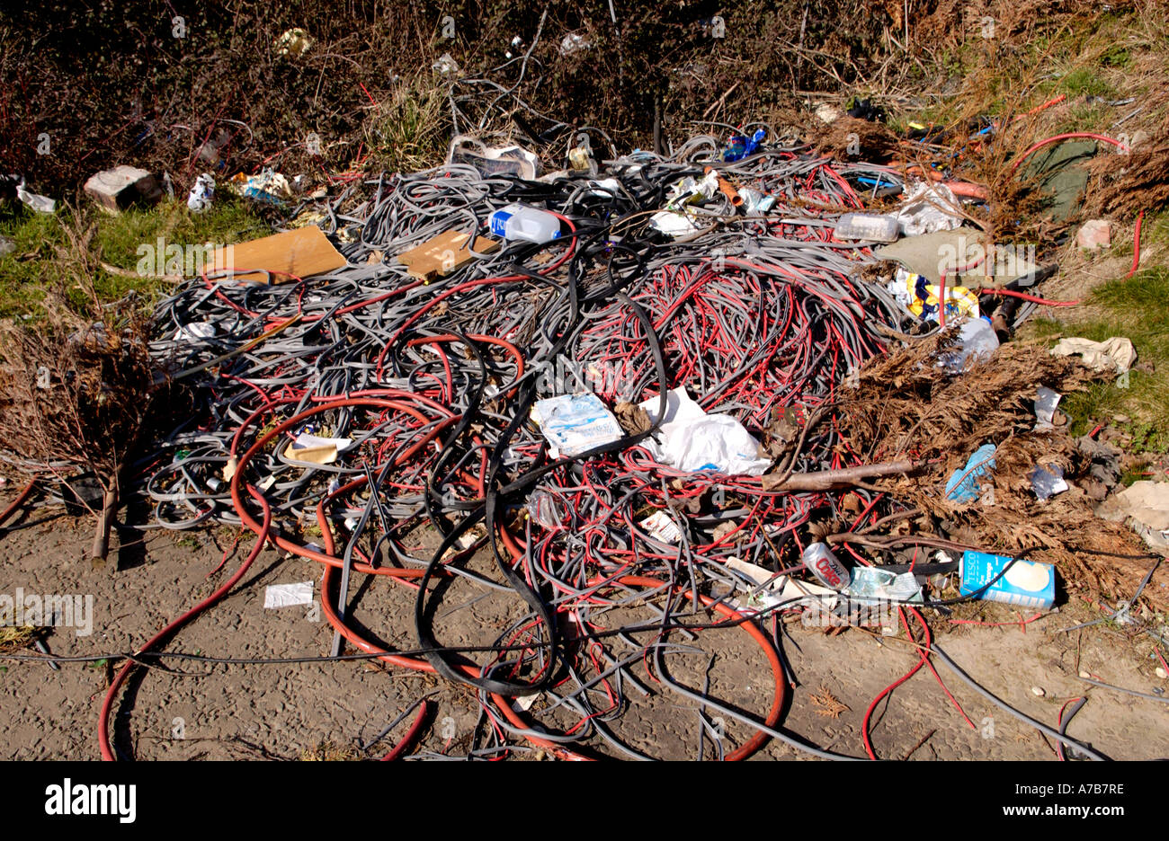 Rubbish left by caravan travellers dumped in car park of disused