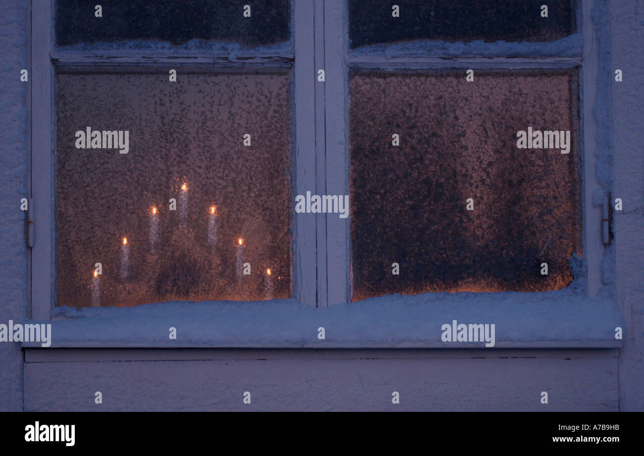 Candles in window Stock Photo Alamy