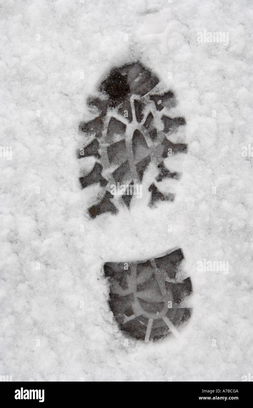 Footprint in the snow Stock Photo