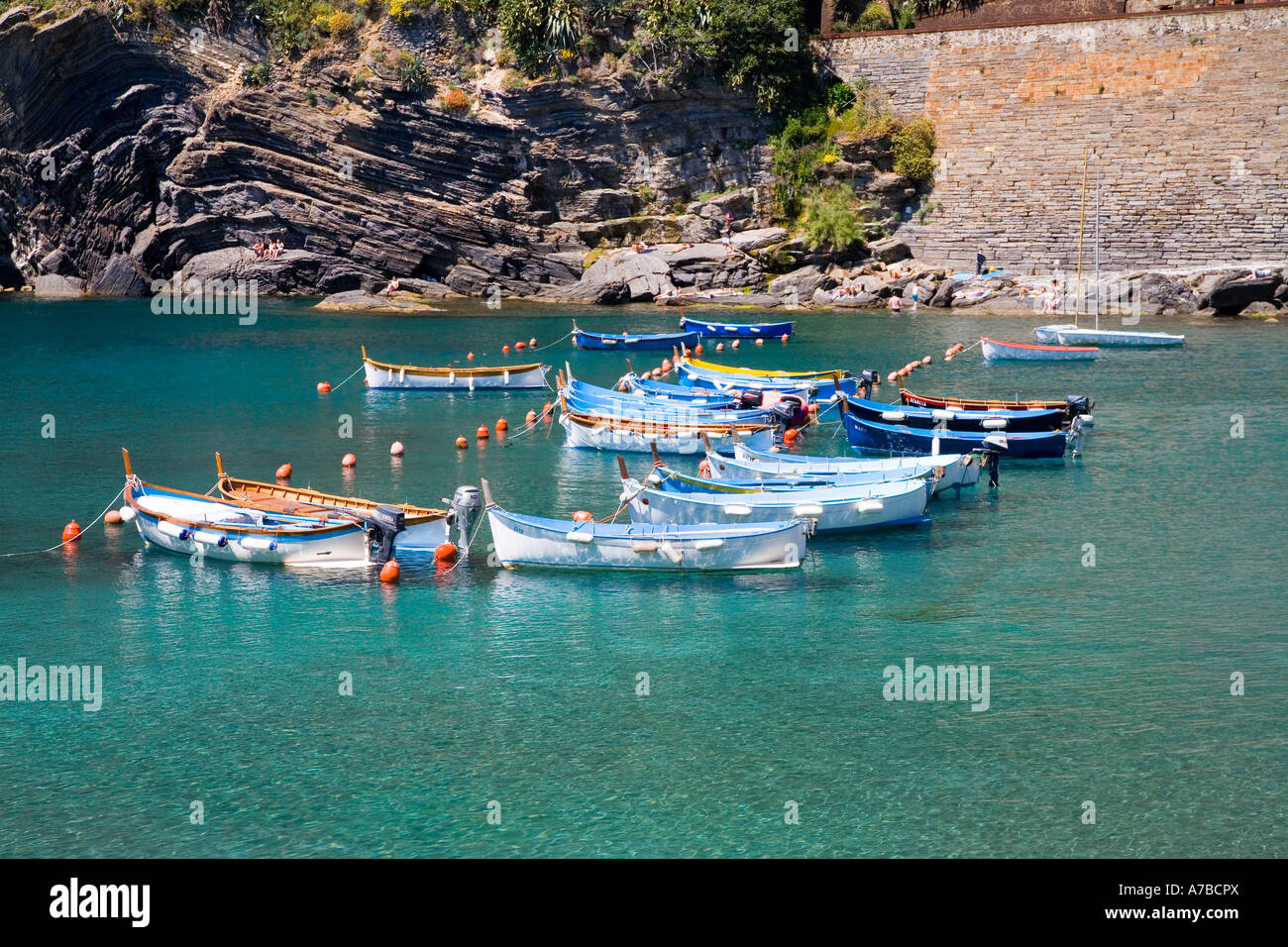 Boats float in harbor of Vernazza one of the five villages in the