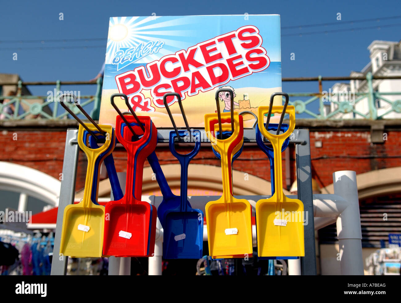 Buckets and spades for sale at a seafront stall in Brighton UK April