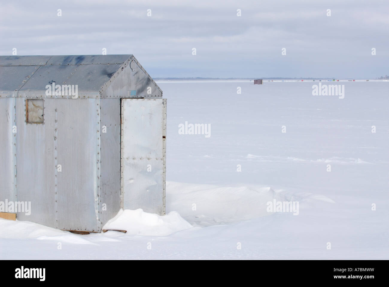 Aluminum Ice fishing huts in the snow on frozen Lake Simcoe Ontario