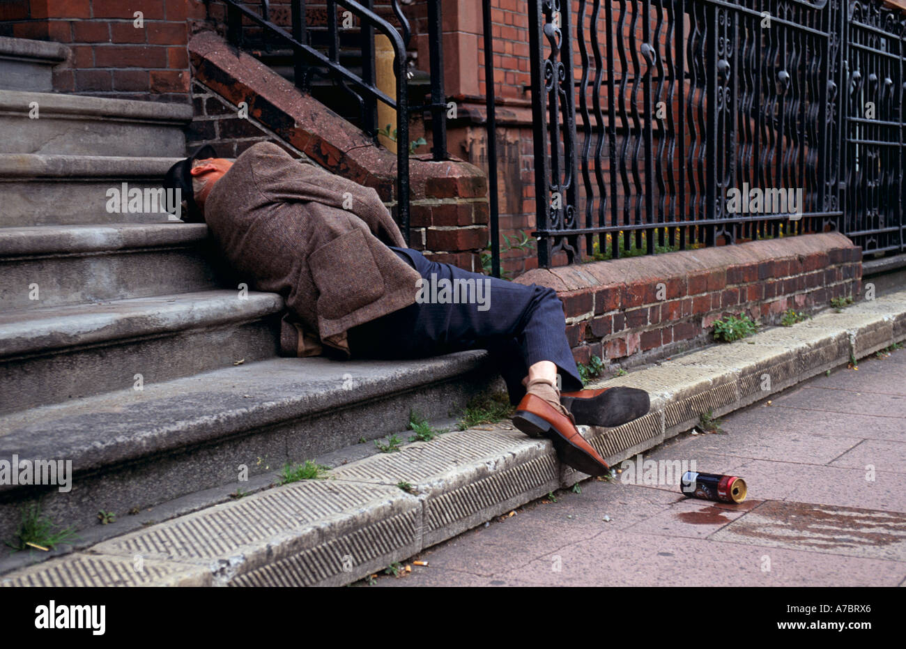 drunk-elderly-homeless-man-asleep-in-pub