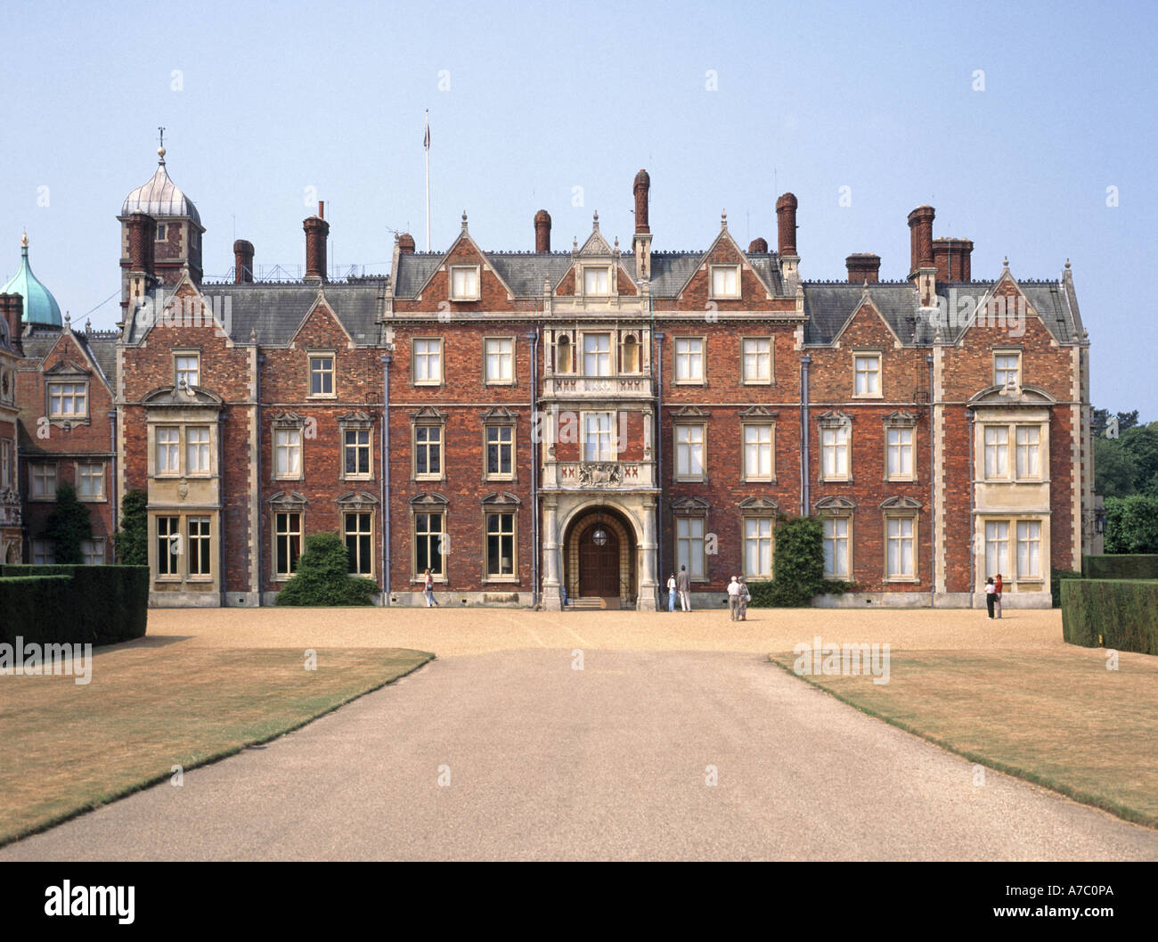 Front elevation façade Royal Residence of Sandringham House & gravel driveway a Grade II country house listed building Norfolk East Anglia England UK Stock Photo