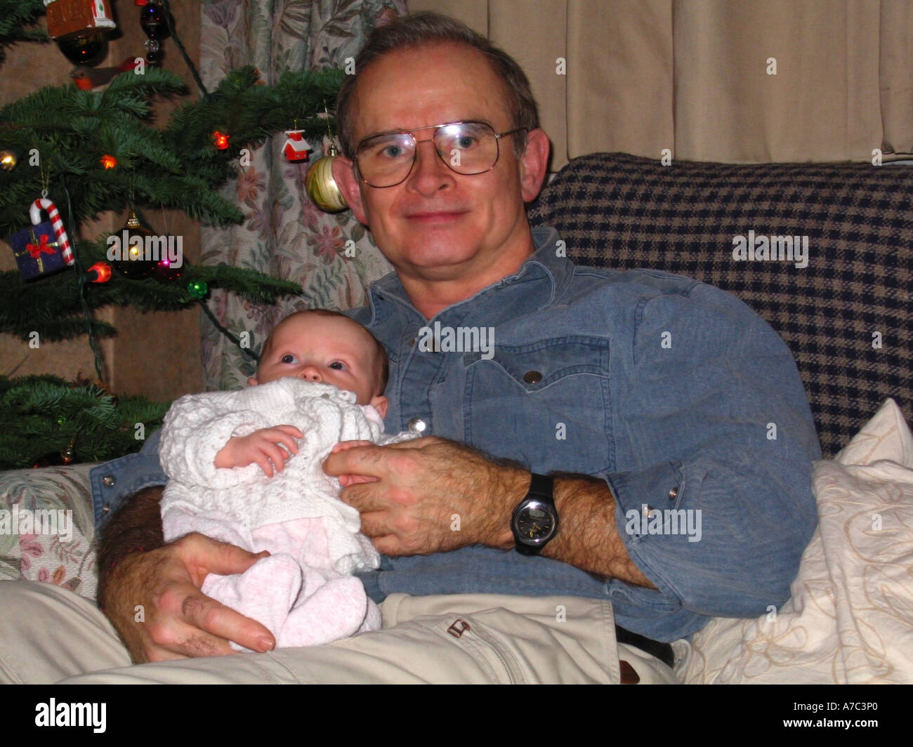 Grandfather and Child christmas tree Ireland Stock Photo