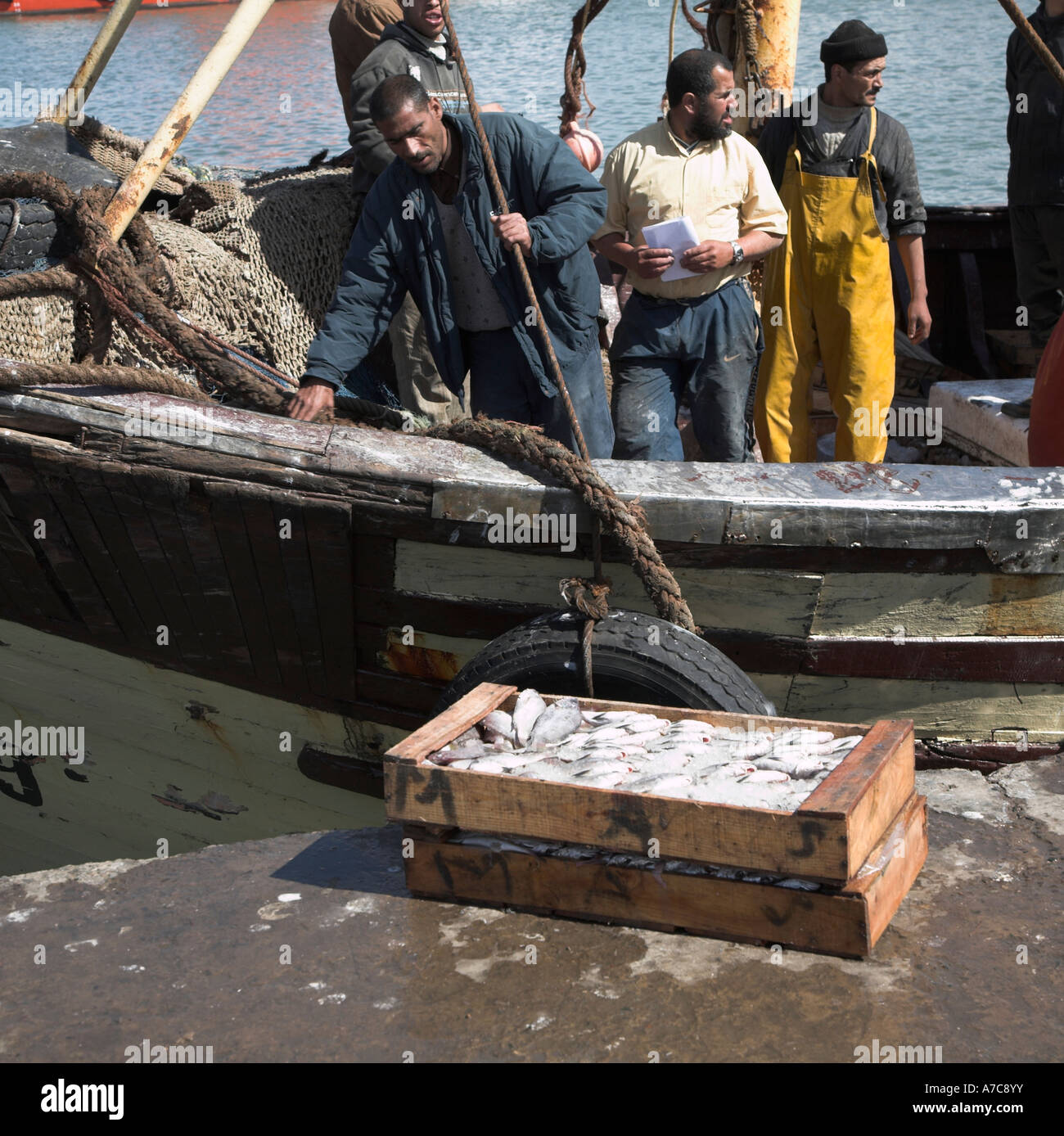 Unloading Fish Unloading fish hi-res stock photography and images - Alamy
