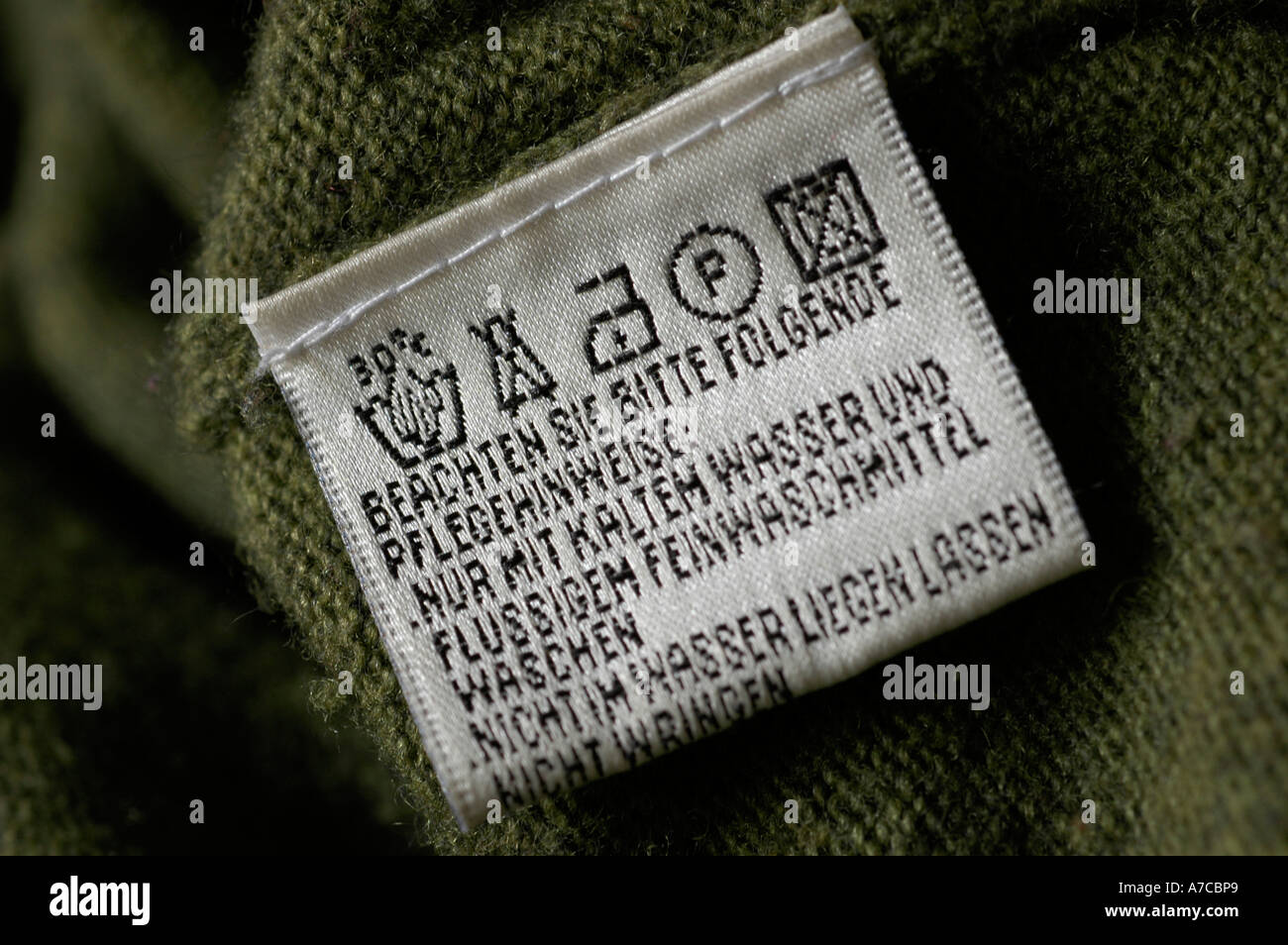 washing instructions label on sweater. (c) by uli nusko, ch-3012 bern. Stock Photo