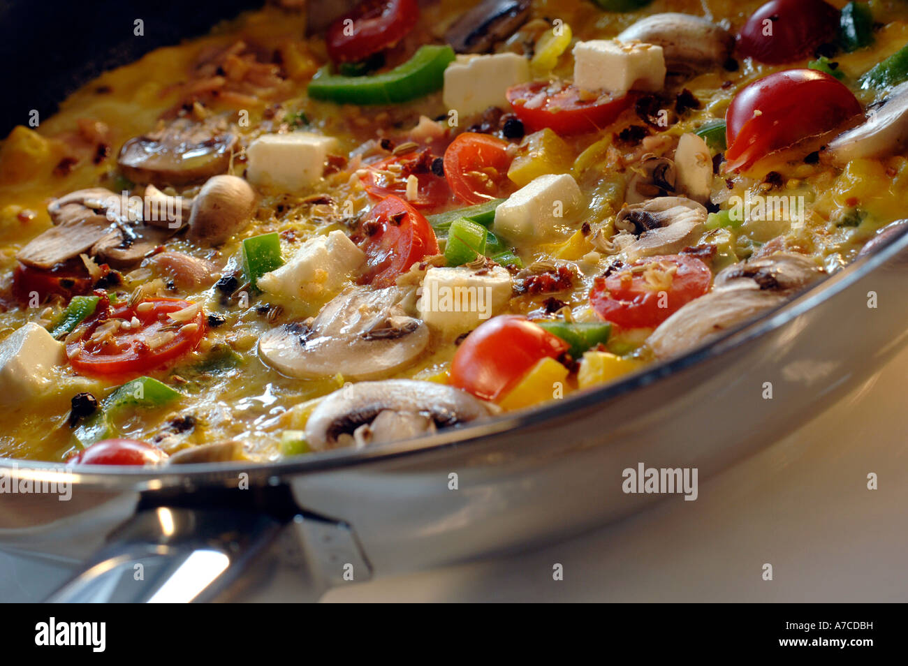 Freshly cooked omelette in a pan Stock Photo