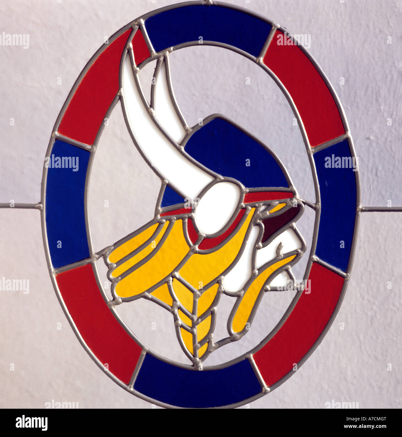 Stained glass window with viking head by craftsman Chris Deming Stock