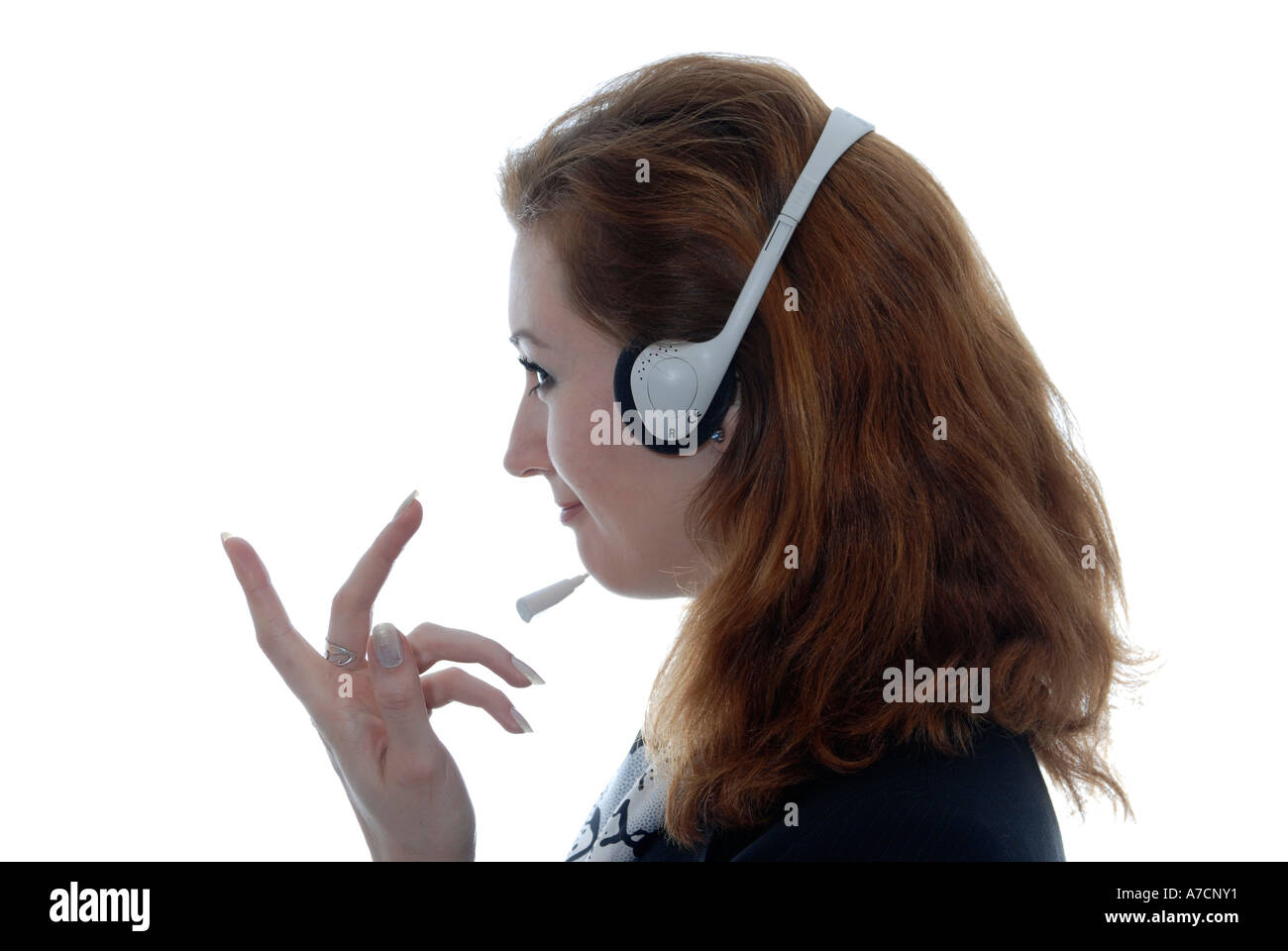 Frau Maedchen braune Haare telefonieren Kopfhoerer callcenter Gestik Gespraech sprechen Job Büro Arbeitsplatz Stock Photo