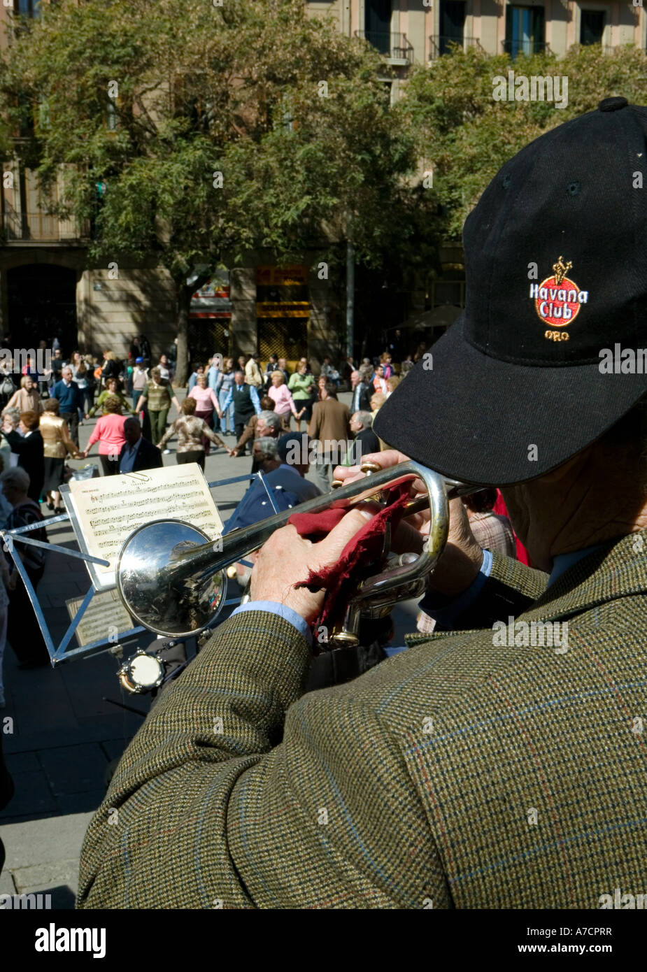 Man wearing hat with Havana Club logo accompanying La Sardana dance Pla de la Seu Barcelona Catalonia Spain Stock Photo